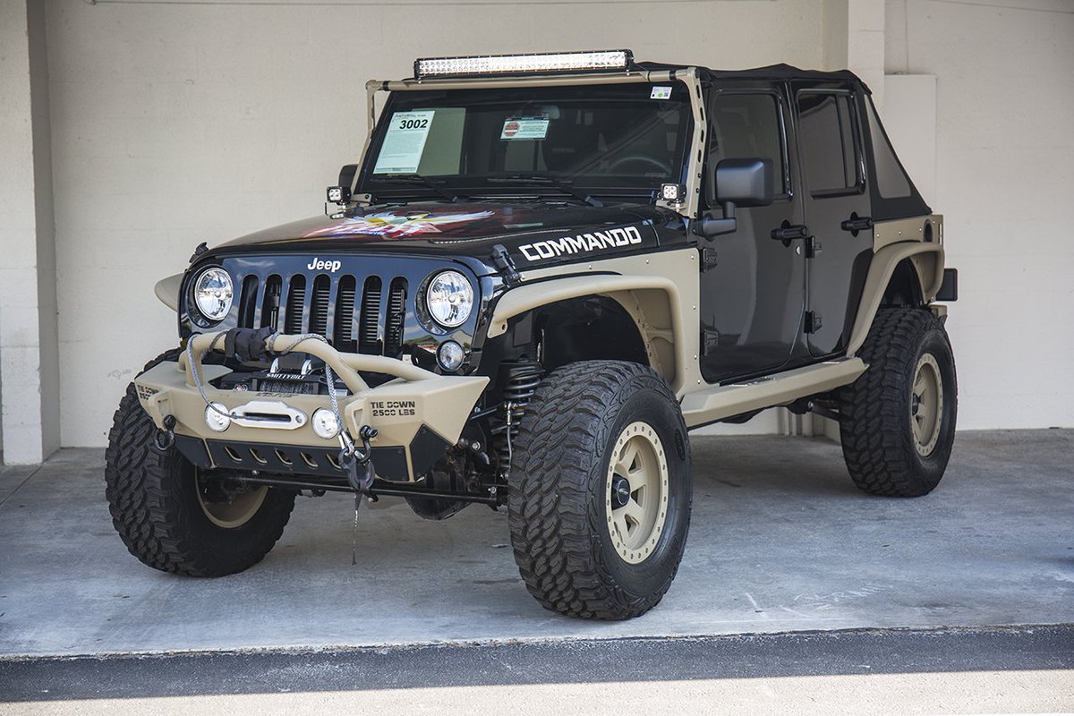 Live <a href="/Barrett_Jackson/">Barrett-Jackson</a>: we’re auctioning off this Jeep Commando to benefit The Patriot Foundation.