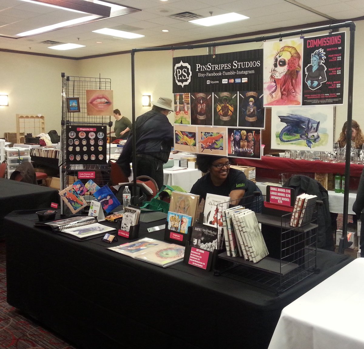glitchikinns's tweet photo. Here we are at @OdysseyCon! Table all set up, now to eat something. #odysseycon https://t.co/RXqxmK9aBd