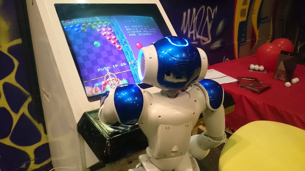 PepperTheRobot's tweet photo. While 'A Pepper's day to you' is taking shape, someone snuck to the arcade #GameOfCode #hackathon #16hoursLeft https://t.co/kEdsh6jMEg