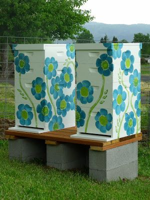 Cheerfully painted #bee #hives. Feel free to send us photos of your hives, we would love to see them! :)