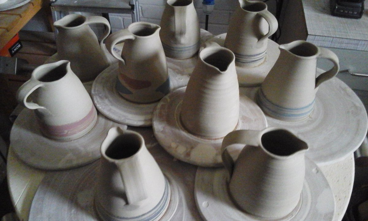 OlleyDesign's tweet image. Nine small jugs ready for firing for the June open studio, Kemsing, Kent. @SEOpenStudios #pottery #ceramics