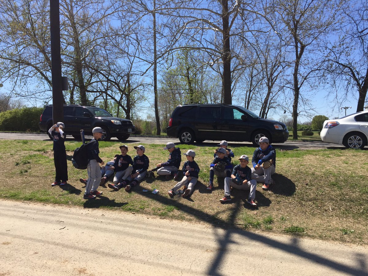 10U Blue enjoying the sun before game two today.....it's much nicer then the 8am game 1