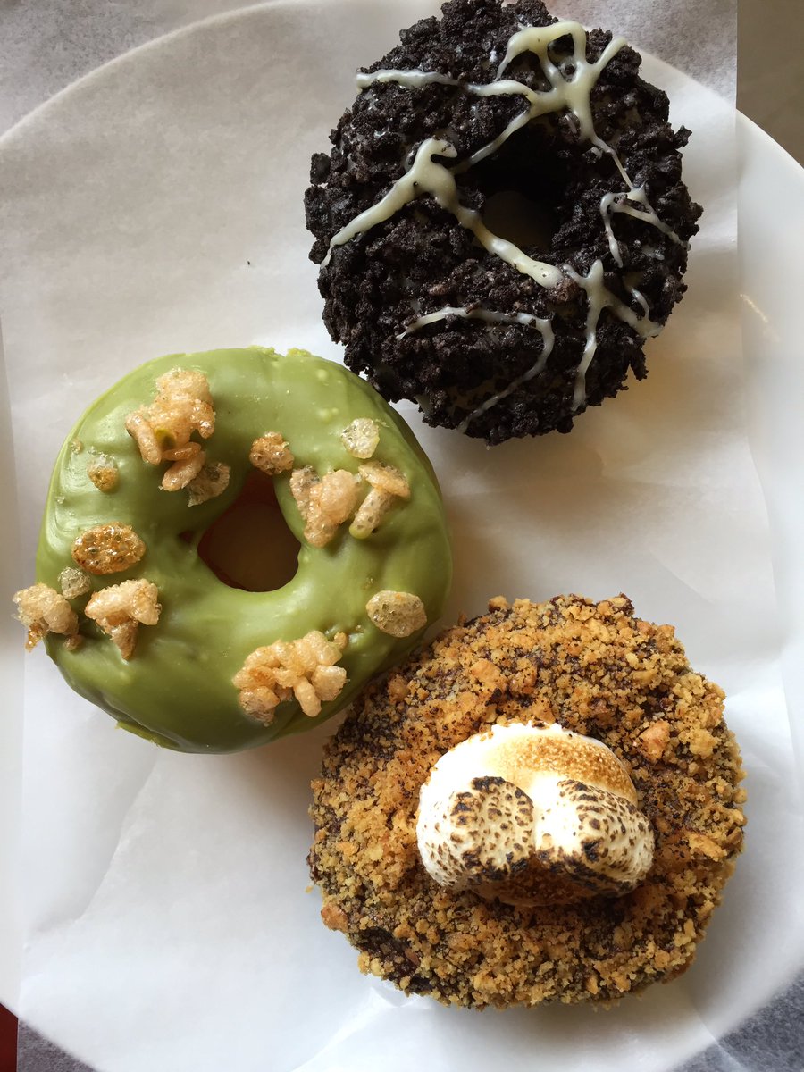 Jonahcancook's tweet photo. Blizzard, matcha, and s'mores donuts @letroudebeigne. Sweet because they're not super sweet. #mtldonutcrawl2016 https://t.co/4n0ycZGXeb