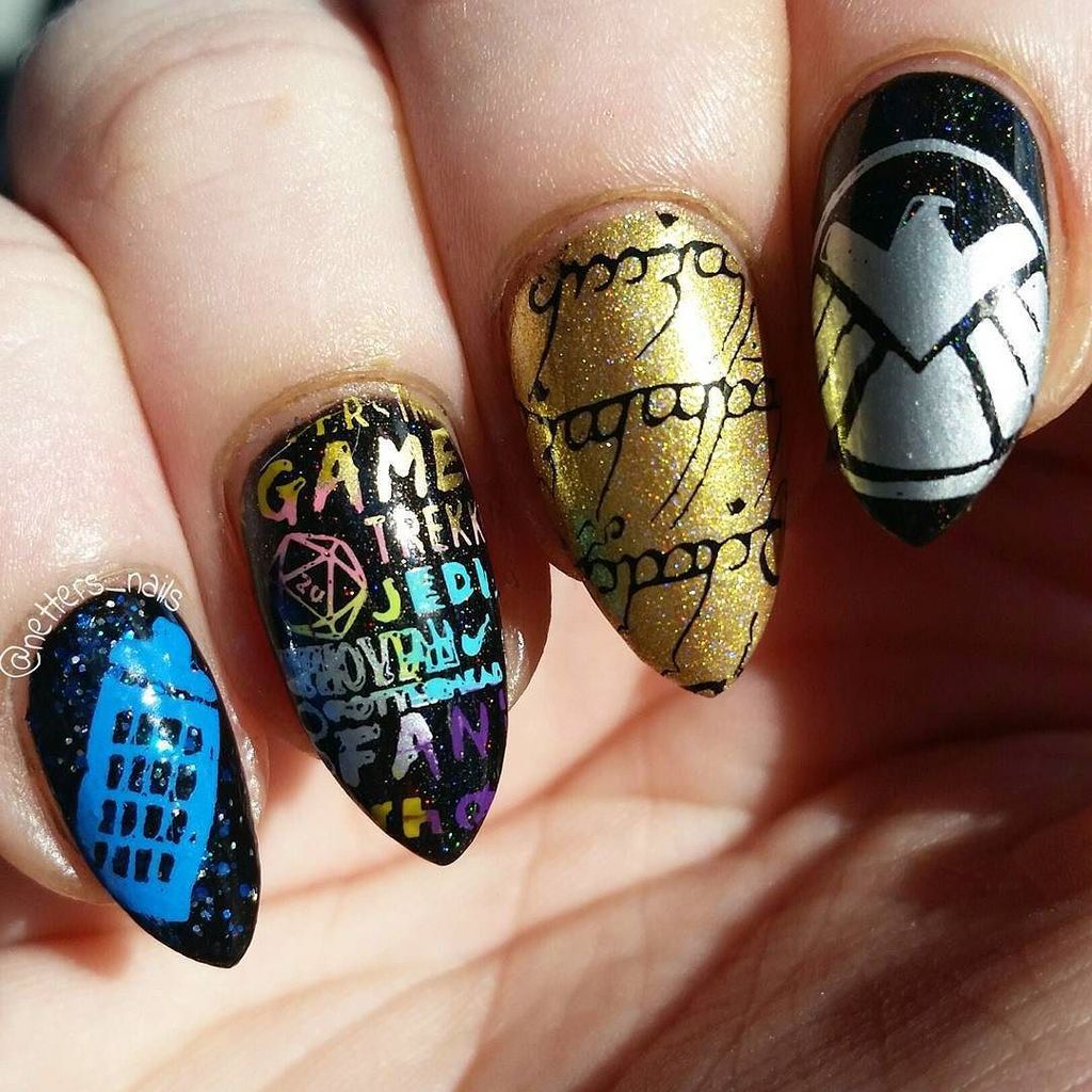 StuffLotr's tweet photo. netters_nails Sun shot of my #wizardworld nails! Details in the original post #conlife #nerdynails #doctorwho #agen… https://t.co/LDYiD8WB0I