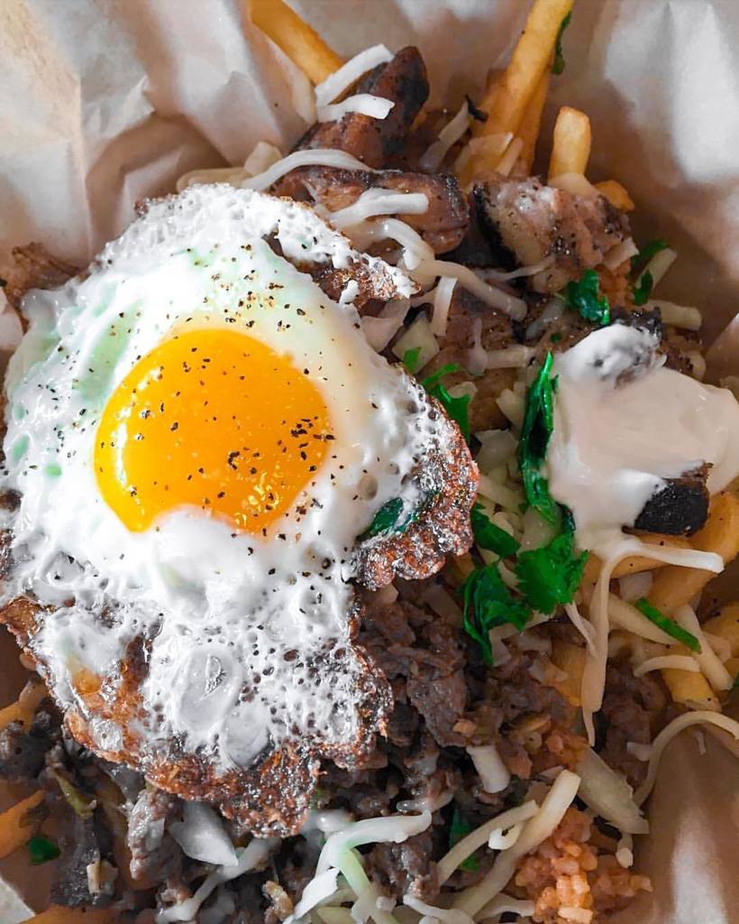 The Stoner Fries at <a href="/doschinos/">Dos Chinos</a> is what's up! Asada Fries with Pork Belly and a Fried Egg! … ift.tt/22kWayG
