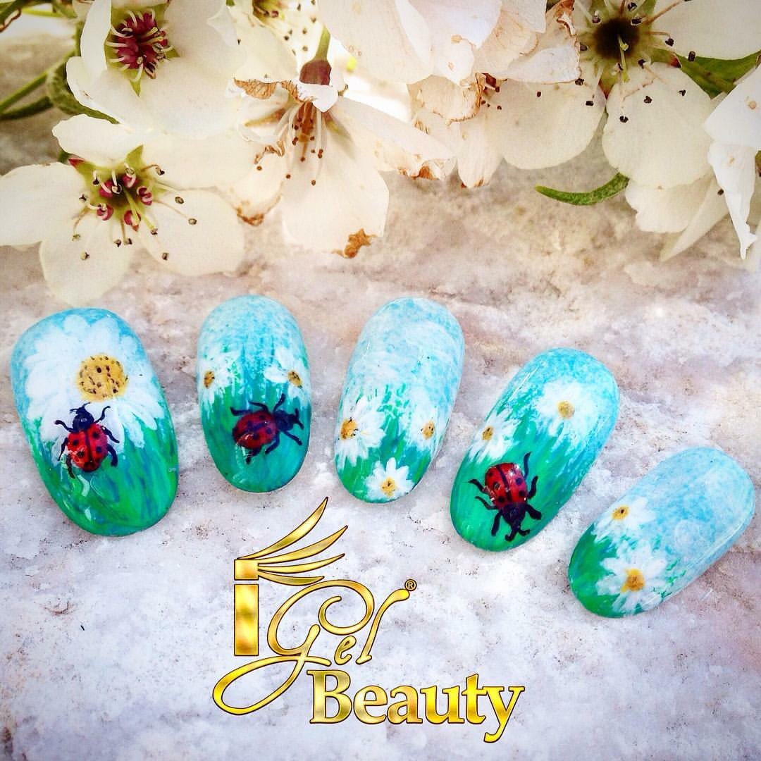 iGelBeauty's tweet photo. "The Lucky Ladybugs" hand painted by #igelbeauty using base color #igelpolish No.1 Pure White and No.104 https://t.co/FILOMx3AOe