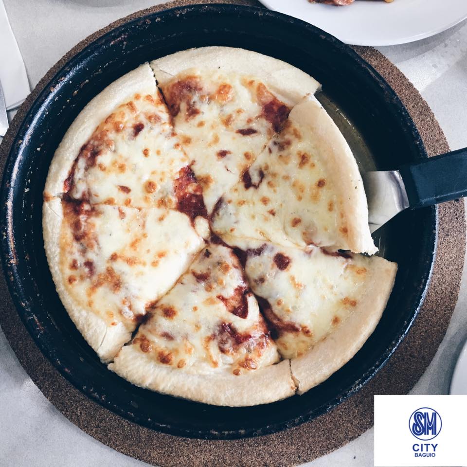 smcitybaguio's tweet photo. Grab a bite of Pizza Hut's Cheesy pizza for dinner found on the Upper Ground Level! #SMEats #EveythingsHere https://t.co/96j0I3tQH6