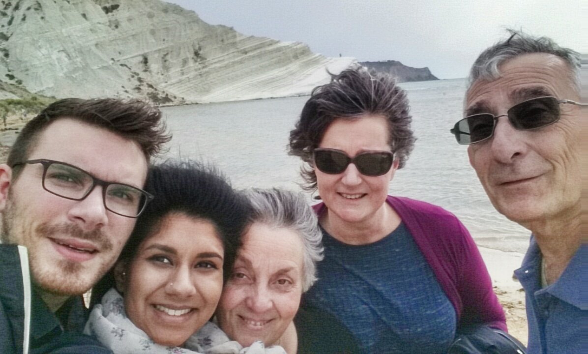 varshi_shah's tweet photo. See that cliff behind us? We're going to climb it! #turkishsteps #sicily #travel #adventure #family #fun #wanderlust https://t.co/itwtdhNAgH