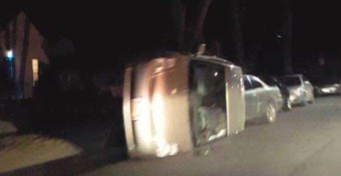 UNDDaveHakstol's tweet photo. Wait, why is my Prius tipped over? https://t.co/GvSuPD7yn5