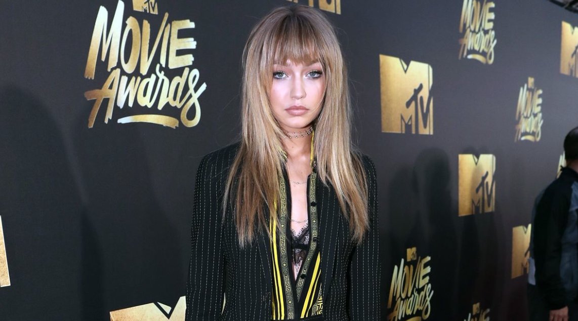 MTV's tweet photo. In love with @GigiHadid's #MovieAwards look. Watch her at tonight's show at 8/7c: https://t.co/4MghgV11U7 https://t.co/J6tieHrWNt