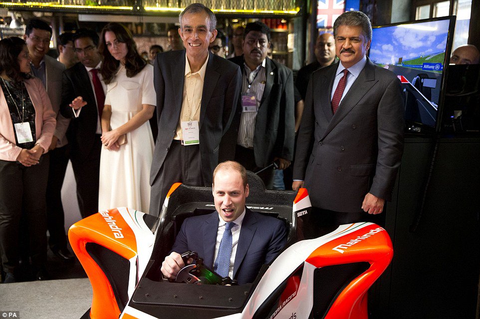 MahindraRacing's tweet photo. The Duke &amp; Duchess of Cambridge joined us for a virtual lap in our #M2Electro simulator today! (via @MailOnine) https://t.co/SxmpkE05Ei