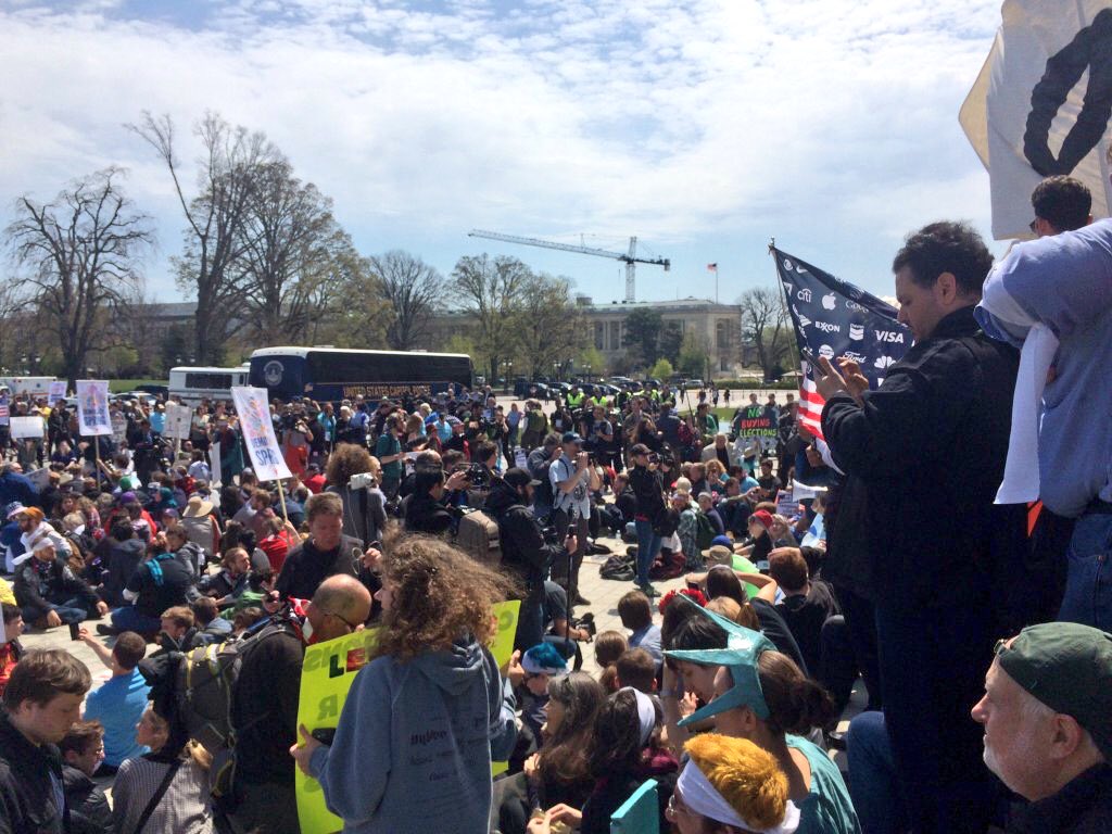 PriceofOil's tweet photo. Arrests begin at #DemocracySpring as hundreds sit in on the Capitol steps. #SpringIsComing (pic from @JoeHuffHannon) https://t.co/W1tt2nQtwc
