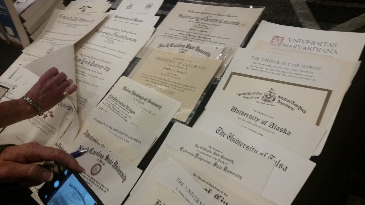 RussPoulin's tweet photo. Allen Ezell on diploma mills: displaying his many fake diplomas from real universities. #NASASPS https://t.co/3yZ4zghNvD