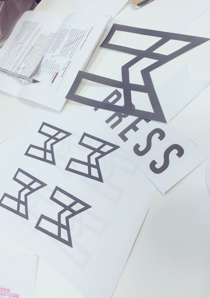MPressAd's tweet photo. Planning tactics and cutting out our logo for an intense photo shoot today. More to come! https://t.co/BKgLlEfznF