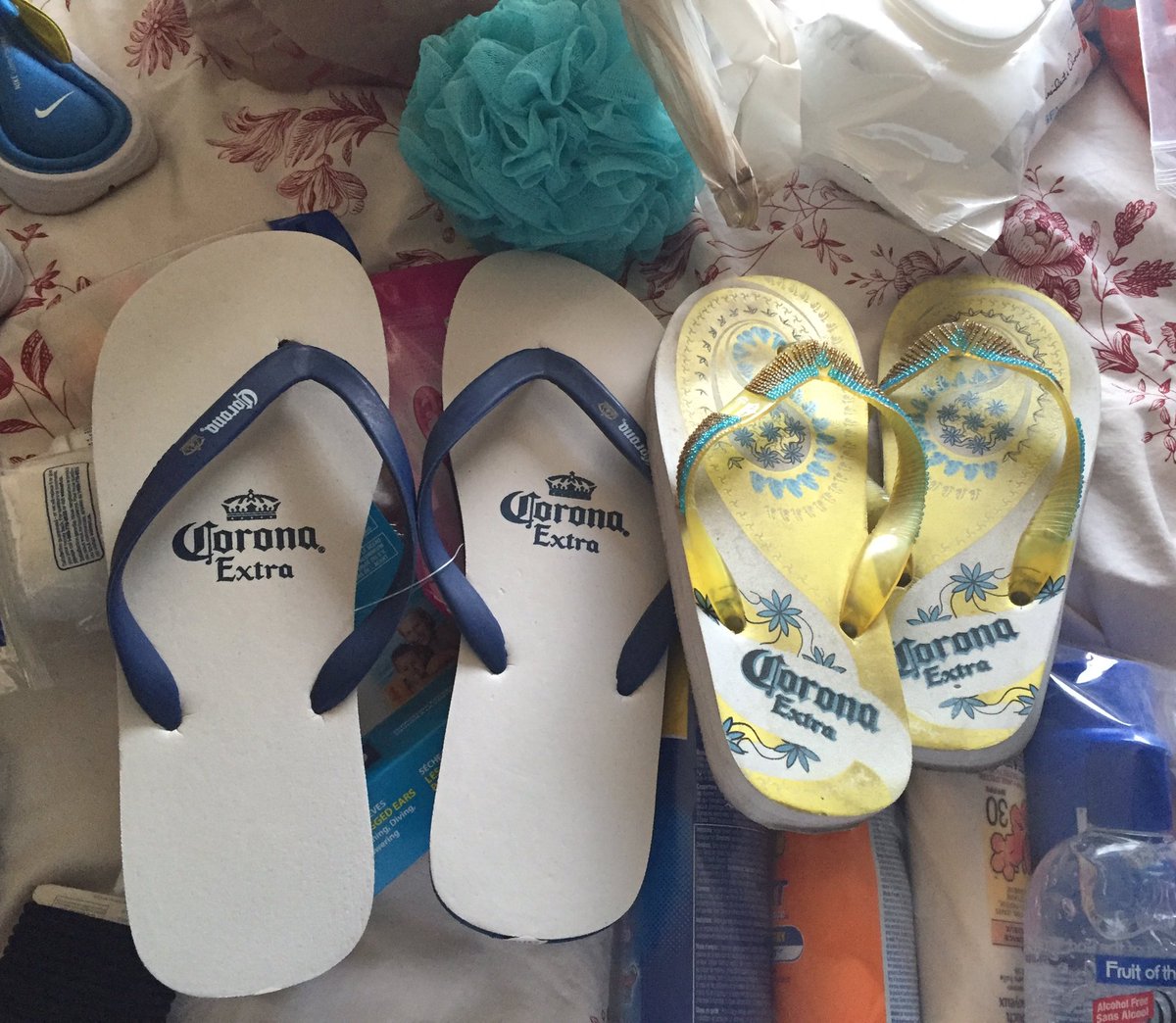 iloveladybugs38's tweet photo. His and hers #Corona flip flops! #honeymoon 5 more sleeps! @SecretsHuatulco https://t.co/ewo5VnBghv