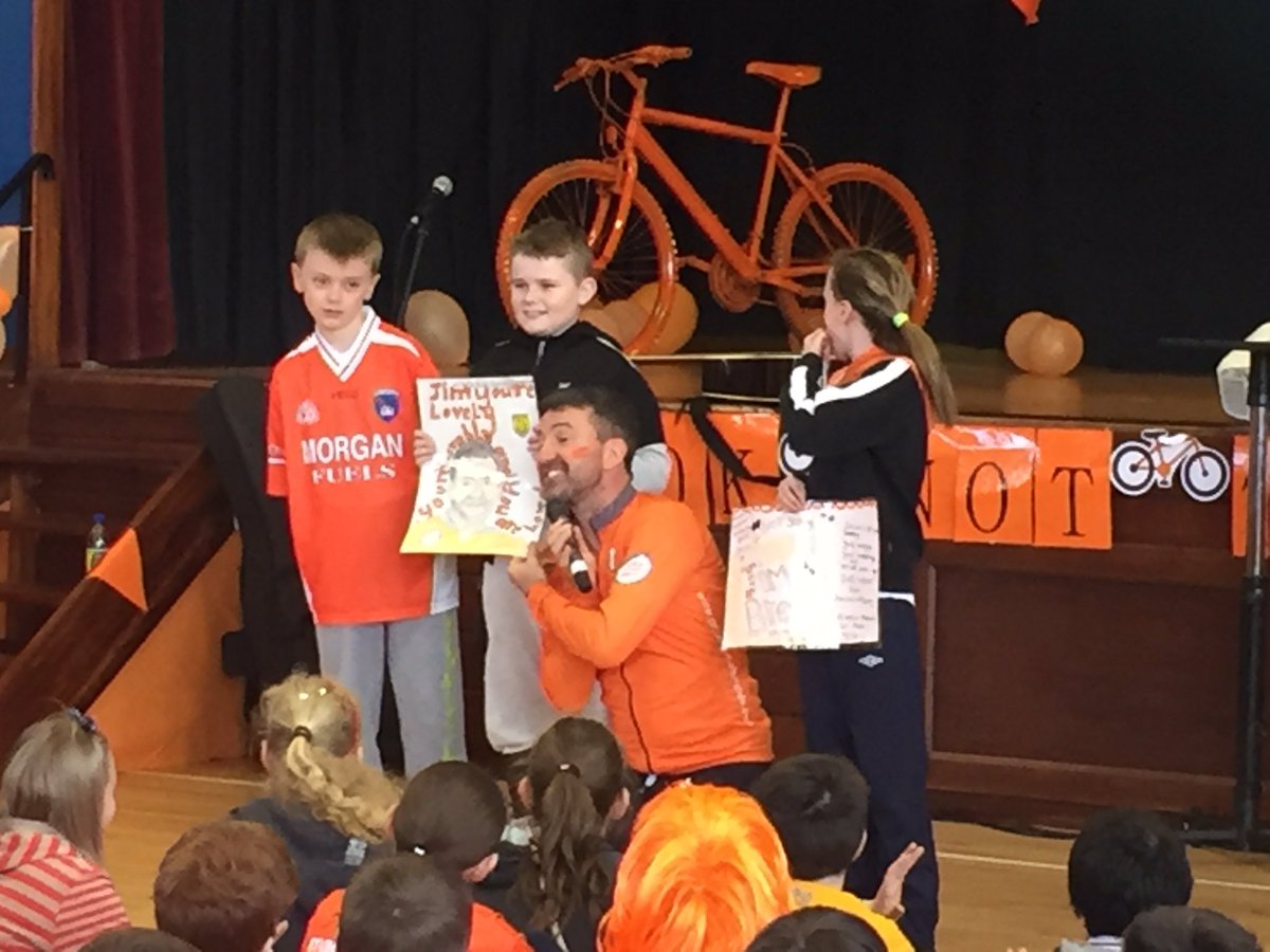 Drumcree College pupils presenting <a href="/jimbreenpulse/">Jim Breen</a> with posters they designed for the <a href="/CASuicide/">Cycle Against Suicide</a> campaign