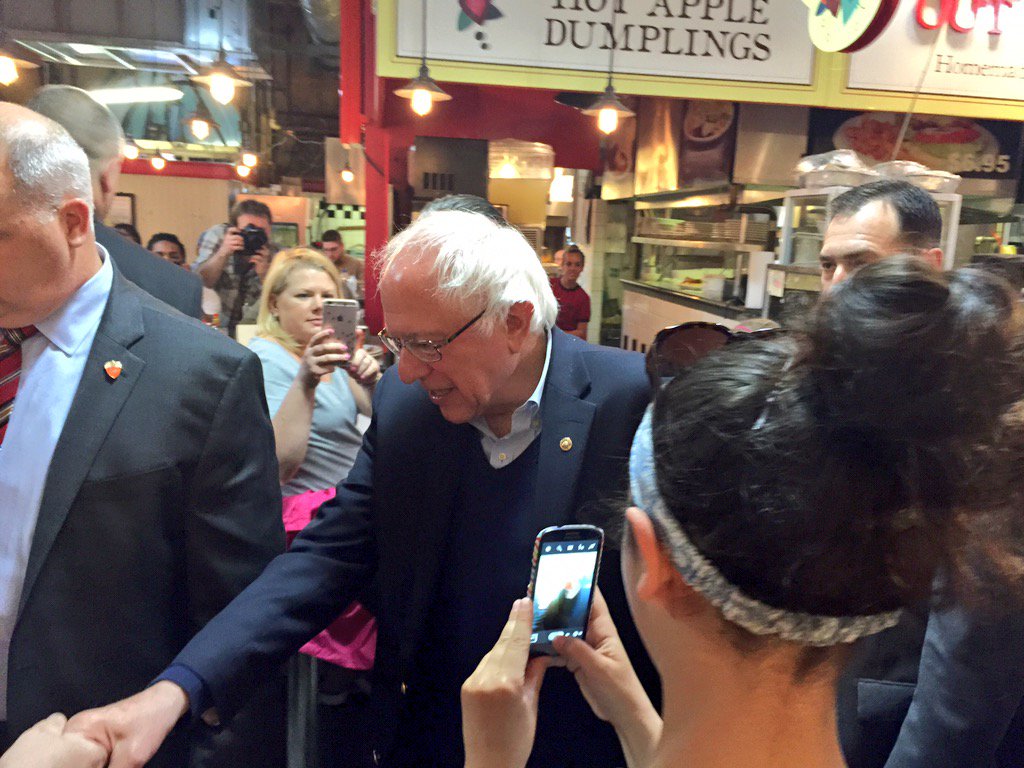 DannyEFreeman's tweet photo. .@BernieSanders taking his hallmark primary day #SandersStroll this morning in Reading Terminal Market. https://t.co/eDJDy6X9K3