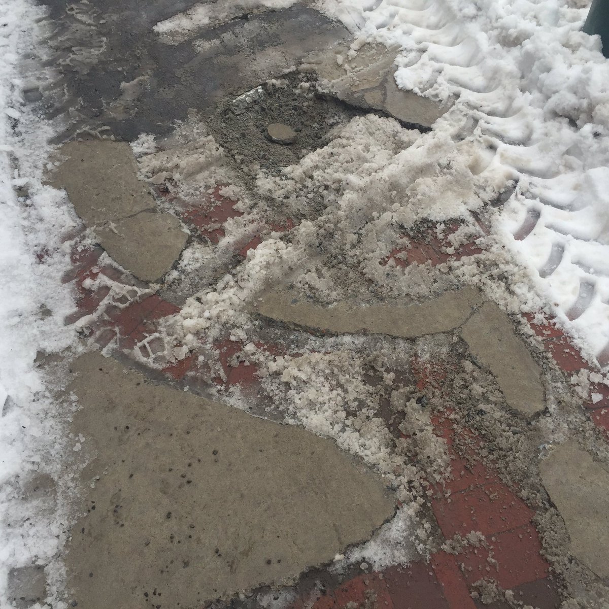 Saw the concrete and brickwork in Somerset Village damaged by snowplow. Fixed with asphalt ottawacitizen.com/news/local-new…