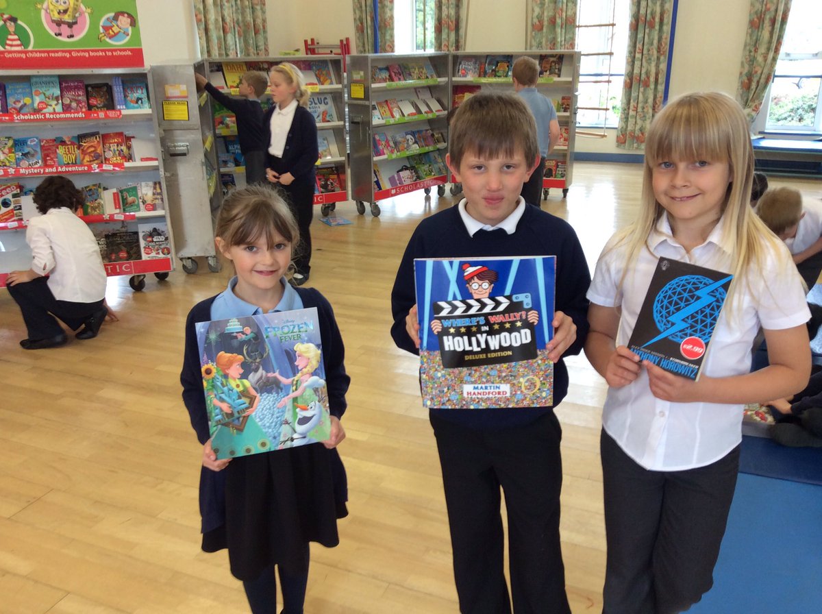 derwentclass's tweet photo. Make sure to check out the book fair only this week! @derwentclass trying some books out! https://t.co/8jU1T3rBqC
