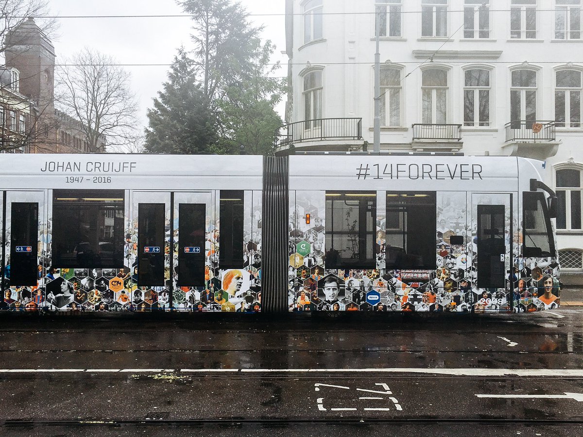 JohanCruyff's tweet photo. Tram14 revealed in #Amsterdam on Johan Cruyff's birthday. Great tribute and teamwork! #14forever @GVBnieuws https://t.co/u5wMb87xAd