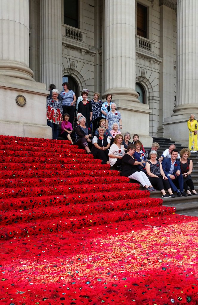 TedBaillieu's tweet photo. @Anzac100Vic #5000Poppies Marg, Phil &amp; Lynn take their tribute to Chelsea Flower Show. TY to Vic Govt &amp; #Qantas https://t.co/xJXbh2xpXT