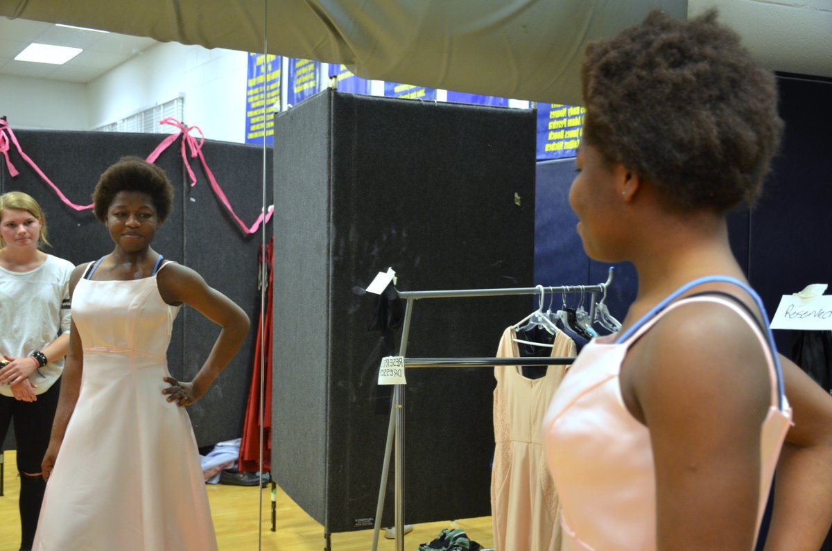 bethesda_today's tweet photo. B-CC students help provide donated prom dresses with 'Once Upon A Prom' event https://t.co/EiC92C5Fgc https://t.co/S5a3t5GL1x