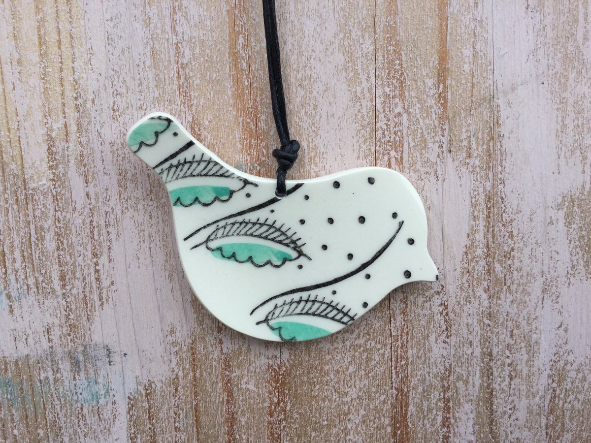 this little bird pendant is an original piece of jewellery made by hand by #upcycling vintage china #eco #gorgeous