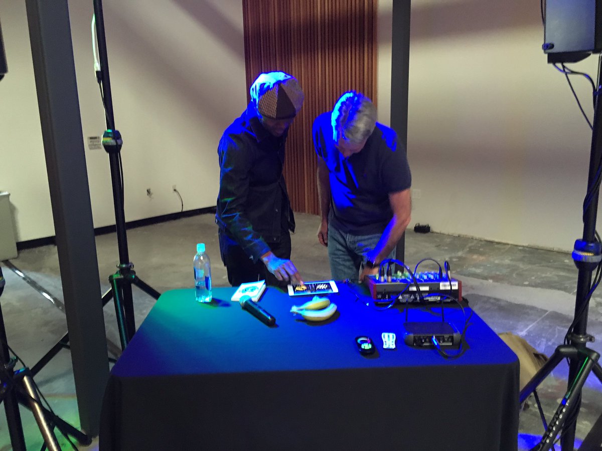 cjweyfo's tweet photo. @djspooky showing @mmccue how to use his DJ mixer app at the @Flipboard #flipspace party https://t.co/daFsqyfxof