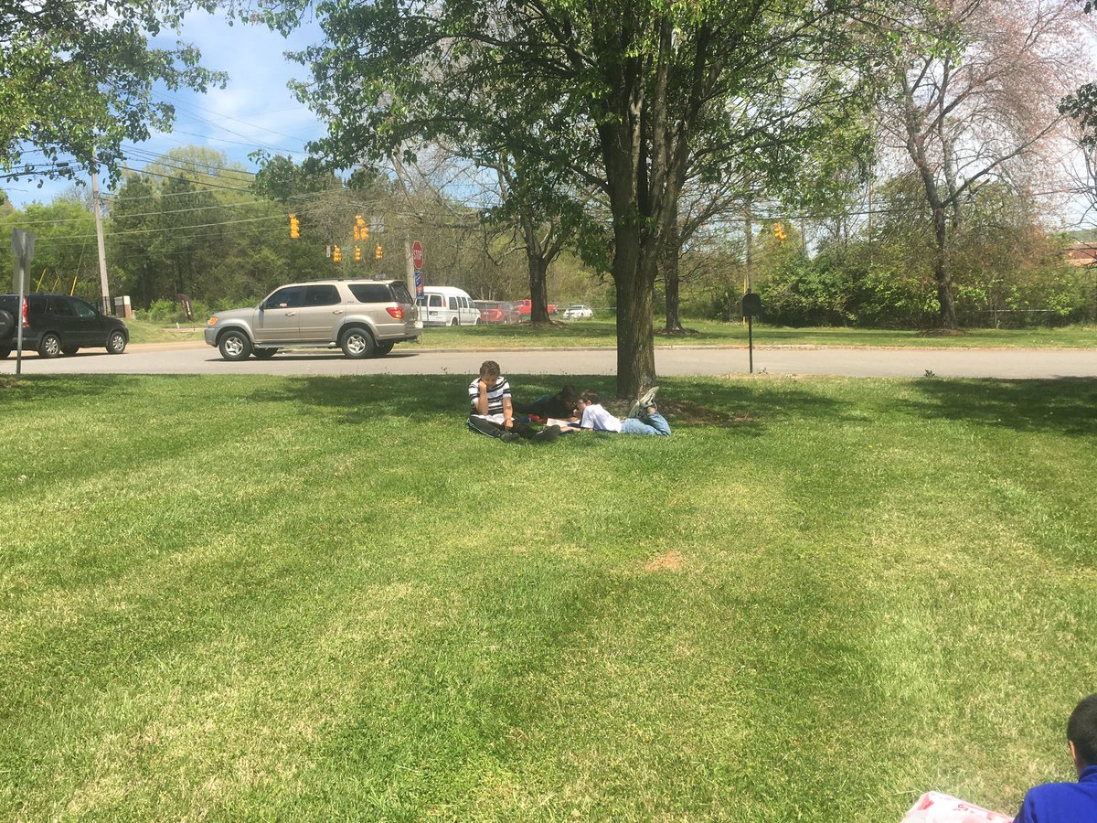 It's a beautiful day for outdoor reading time. #funfridayafterbookfair #adventurelearning
