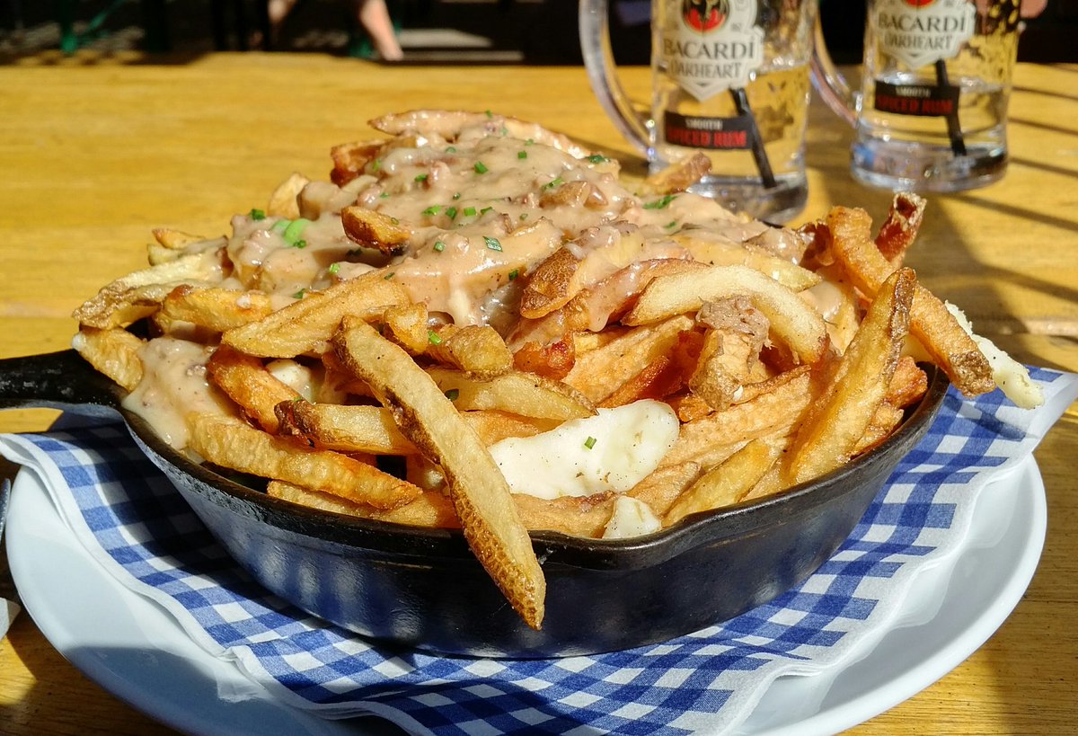 akwest's tweet photo. Smoking Duck Poutine - duck fat fries, peas, cheese curds, gravy, truffle oil and duck confit. #wurst #yycpoutine https://t.co/zPji6JLeam