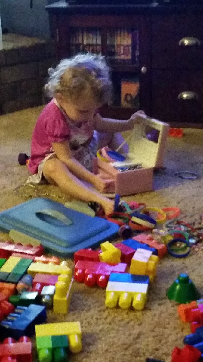 My sweet niece, playing with her jewelry,  so love our weekend together!