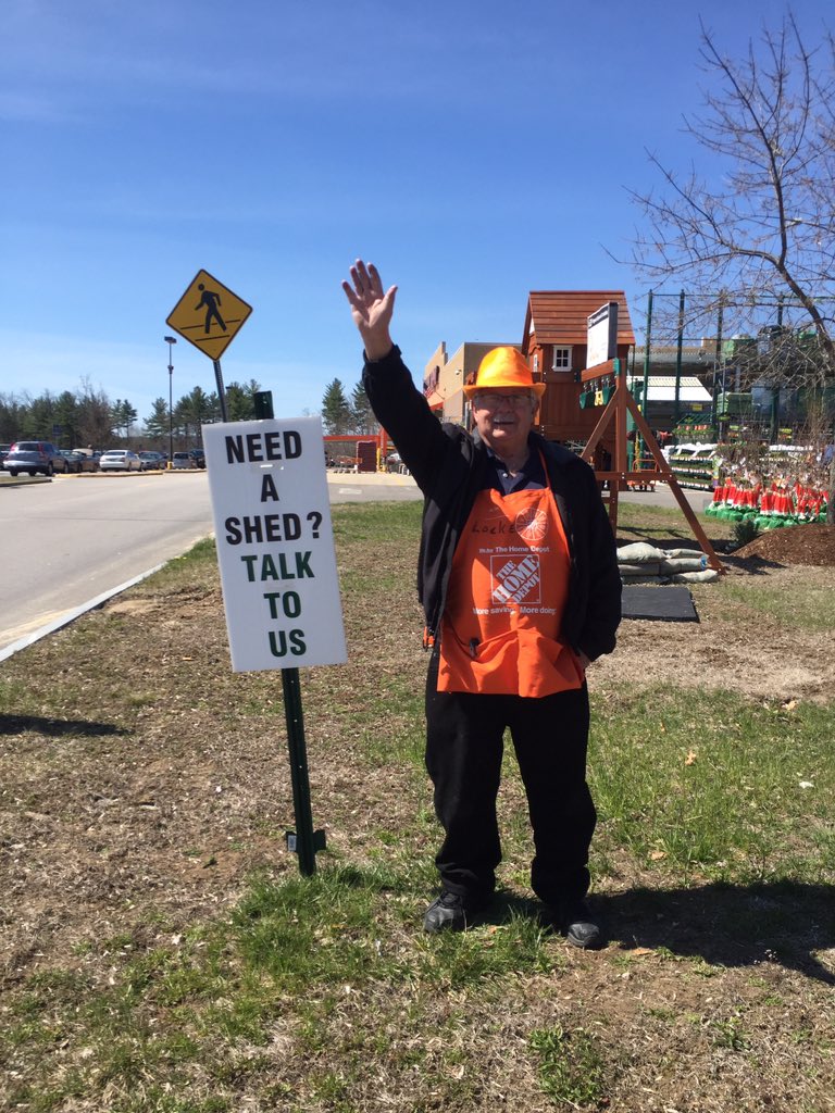 Locke in the parking lot meeting customers and selling sheds