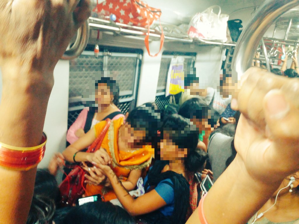ReshmaNarkhede's tweet photo. Hatts off to this #commuters...Mehandi programm going on in virar #train  Everything can happen in #MumbaiLocal https://t.co/wCkV1iCpG7