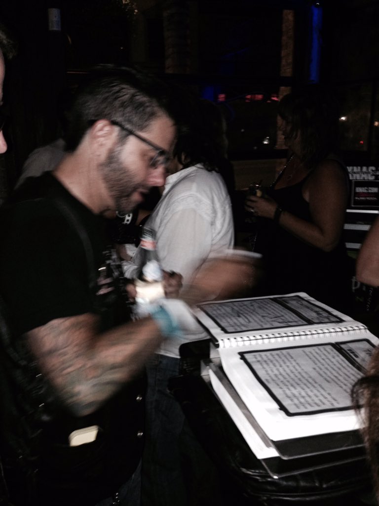 mjschneids's tweet photo. #cathouselive2015 @FoftheSS book signed by @RikiRachtman &amp; members of @fasterpussycat @RikisRacPac #CathouseXXX https://t.co/VoadGrhabU