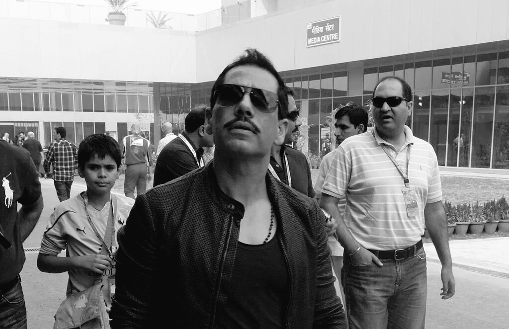HistoryRevisits's tweet photo. Mohammad Azharuddin looking at Dawood in stadium balcony for a fixing signal. Sharjah (1995) https://t.co/ReqrJ13sQw