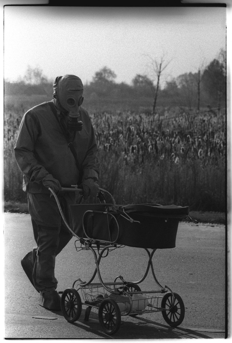 NotableHistory's tweet photo. A Liquidator pushes a pram contaminated by radioactive particles in Pripyat, Ukraine, https://t.co/PpffNzFhb9