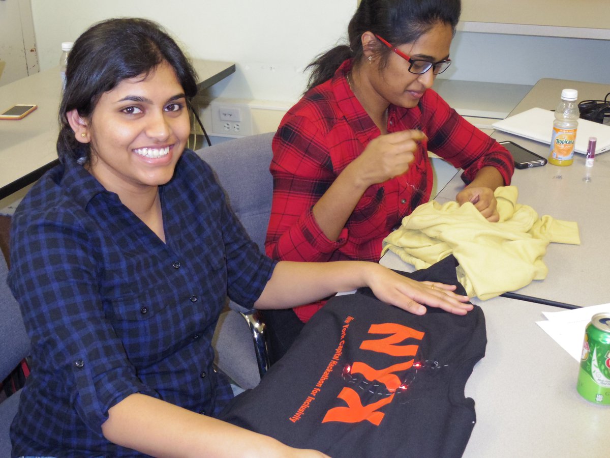 CameronIMine's tweet photo. Totally loving the hacked t-shirts and hoodies!! Thanks @lintquent for teaching!
#NYChi #wearables #sparkfun @redhat https://t.co/0u9uSFkmck