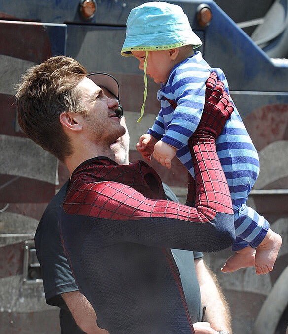 tbhmeangirIs's tweet photo. if you ever feel sad just look at these pictures of andrew in his spiderman suit with kids https://t.co/hxWfJXreFM