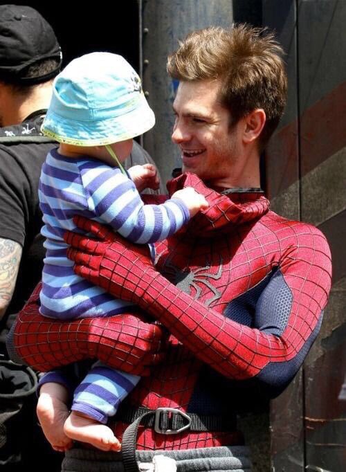 tbhmeangirIs's tweet photo. if you ever feel sad just look at these pictures of andrew in his spiderman suit with kids https://t.co/hxWfJXreFM