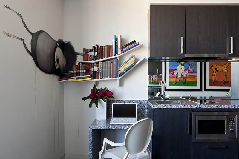 Bold and brazen, the artwork of Stormie Mills brings a sense of enigma to our Street Art Suites