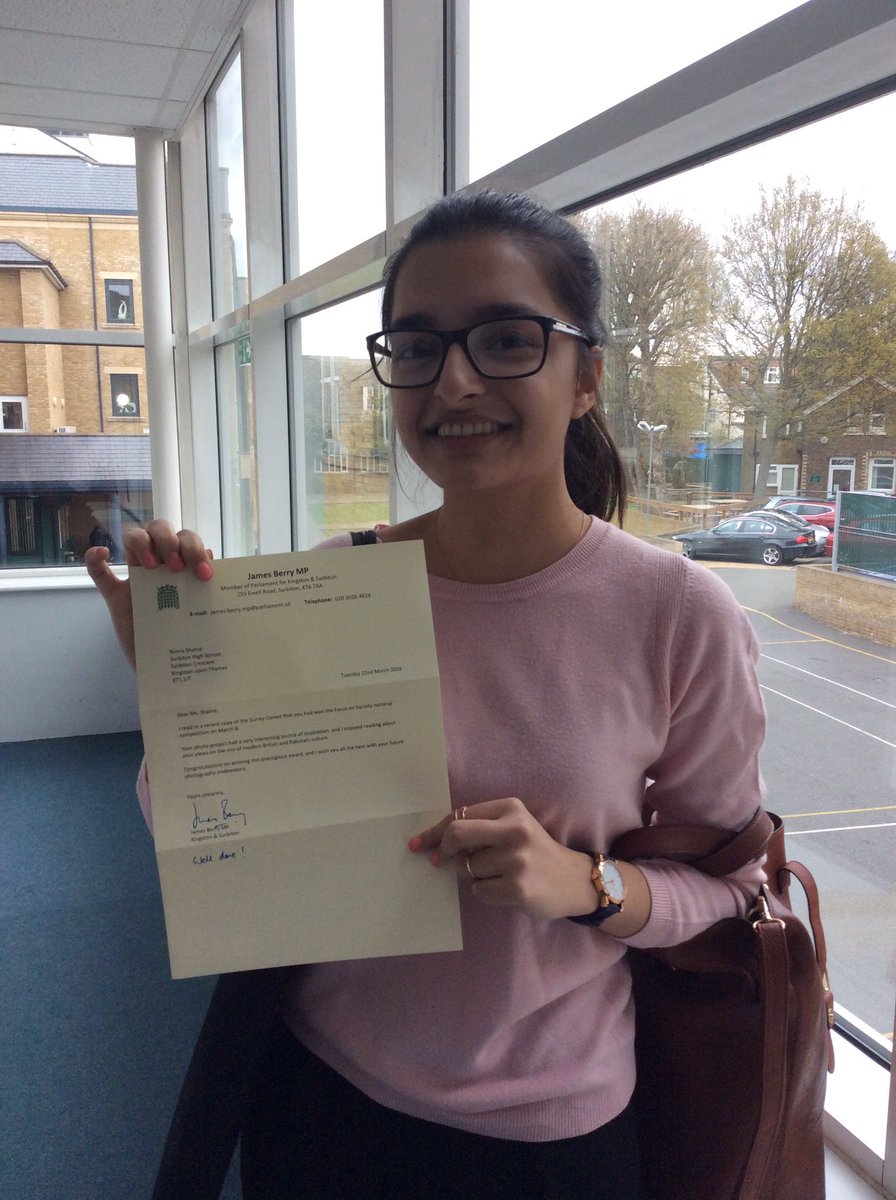 SurbitonHigh's tweet photo. Inspirational Nimra receiving congrats from @JamesBerryMP for winning National Photography comp. SJD @AnnHaydonSHS https://t.co/MmmDj6NEhu