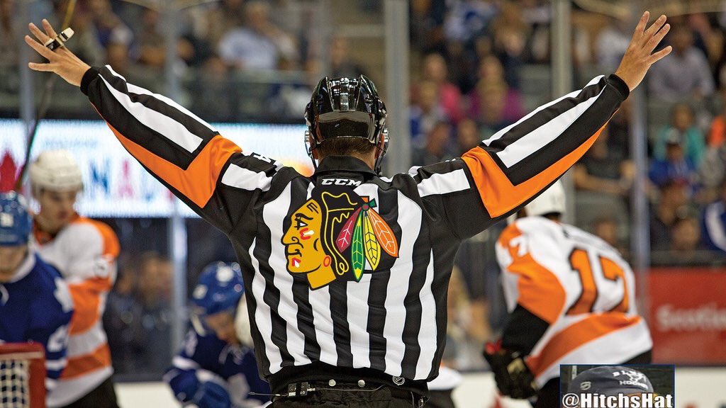Notarasenko's tweet image. what the refs were wearing in game 2
