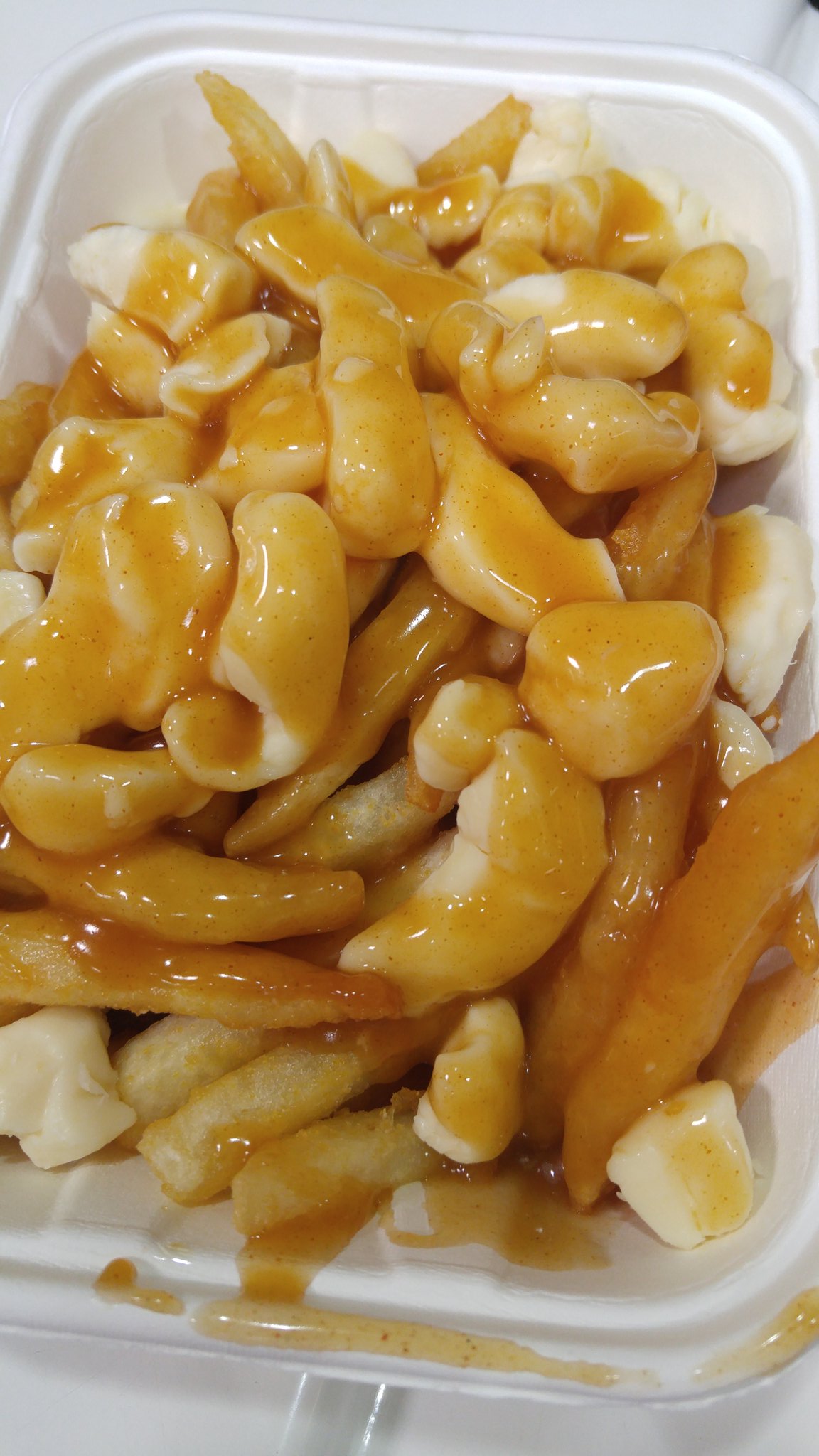 This is how we do poutine in Canada. With curds, not grated https://t.co/d1SHx1LqWO