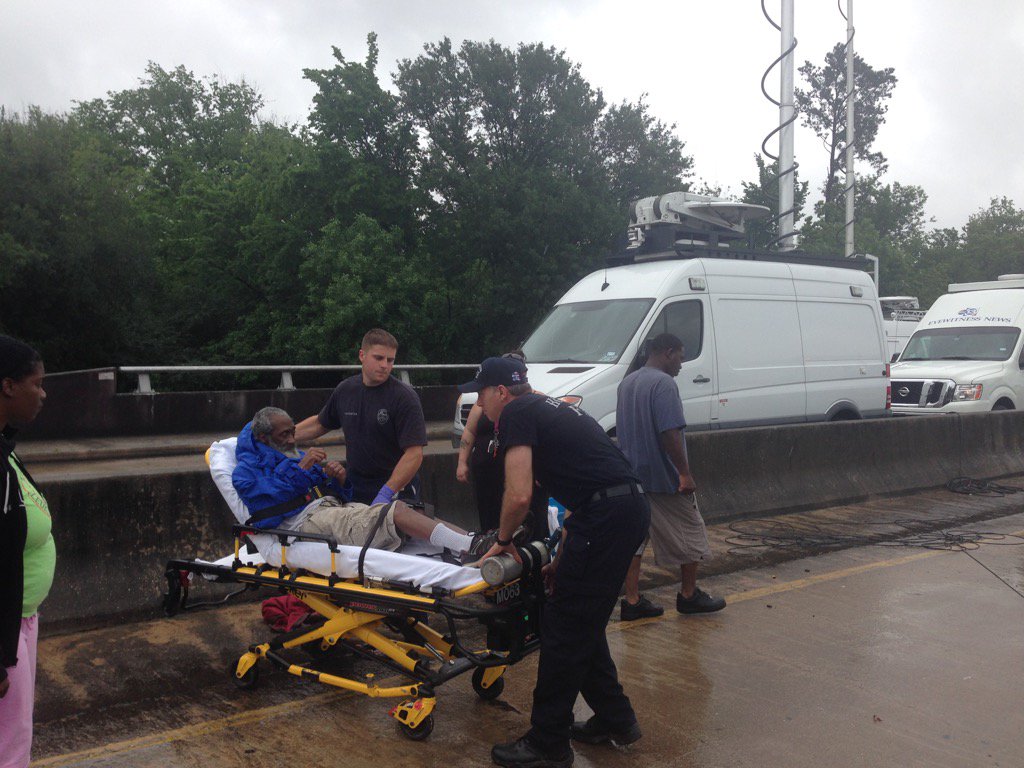 Paralyzed man evacuated from flooded apartment picked up HFD paramedics. #KHOUweather #khou11