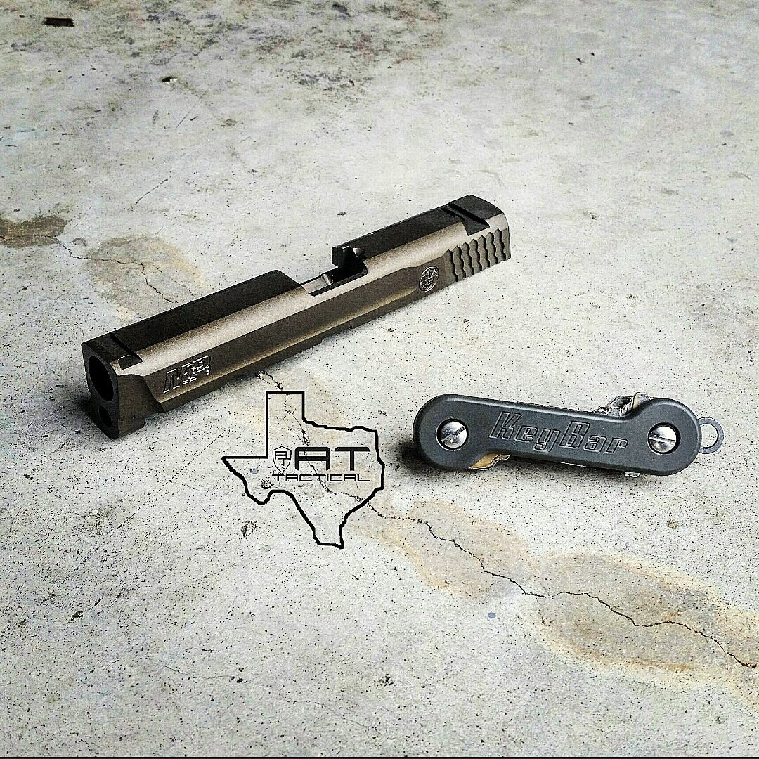 ATTactical's tweet photo. M&P 9 in Burnt Bronze and keybar done in our new AT Foliage.
#attactical #everydaycarry #mandp #keybar https://t.co/0cXXMuX3gh