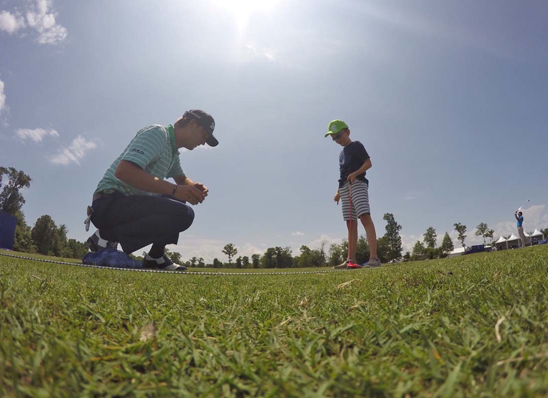 PGATour's tweet photo. Smylie Kaufman stopped by to give this former Shriners Hospital patient some pointers on the practice tee. https://t.co/U9Q9nWwUC2