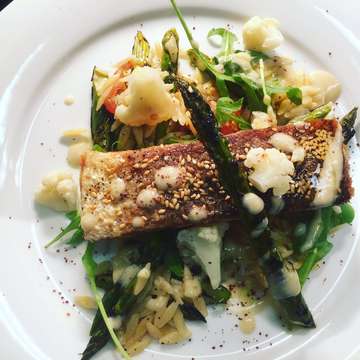 Bit different but  delicious- Salmon, charred asparagus, Orzo pasta, pickled cauliflower and tahini vinaigrette. Yum