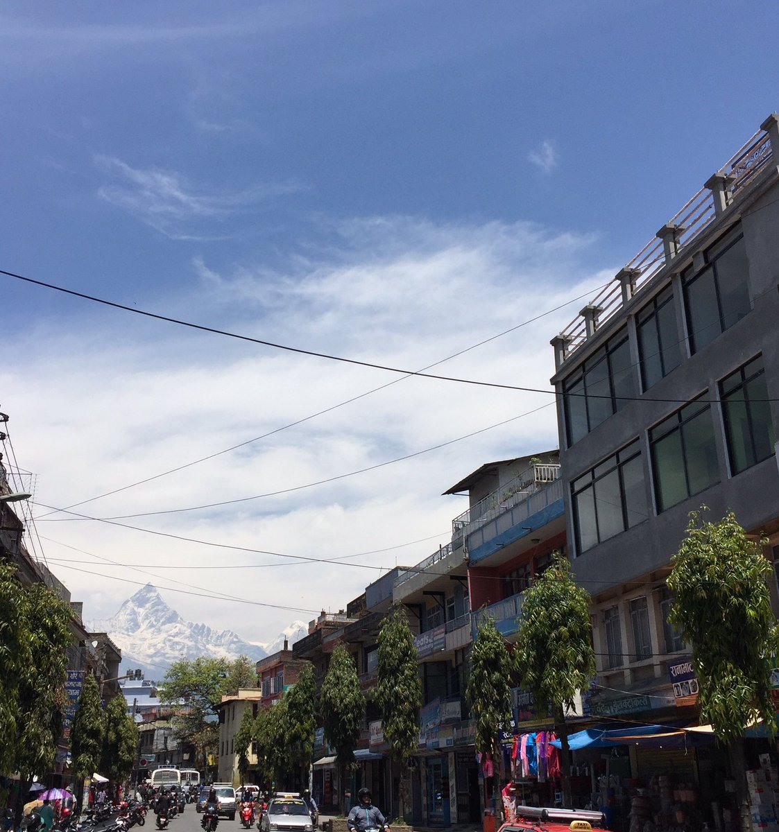 iamdsafe's tweet photo. #explore #mtfishtail #bluesky #clouds #localcabs #localbus #highstreetofPokhara #Mahendrapool #Pokhara #Nepal🇳🇵 https://t.co/9NFzUzvBFB