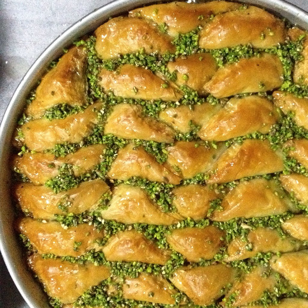 hugh__collins's tweet photo. Had the best morning at a #baklava bakery in #Gaziantep. Just look at the colour of the pistachios! @GoToTurkeyUK https://t.co/j9EZ5wW5fu