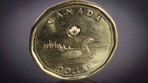 CBCTheNational's tweet photo. The Loonie hit a 9 month high today. https://t.co/S6z5ANtxz4 https://t.co/rL6hXJS4tF